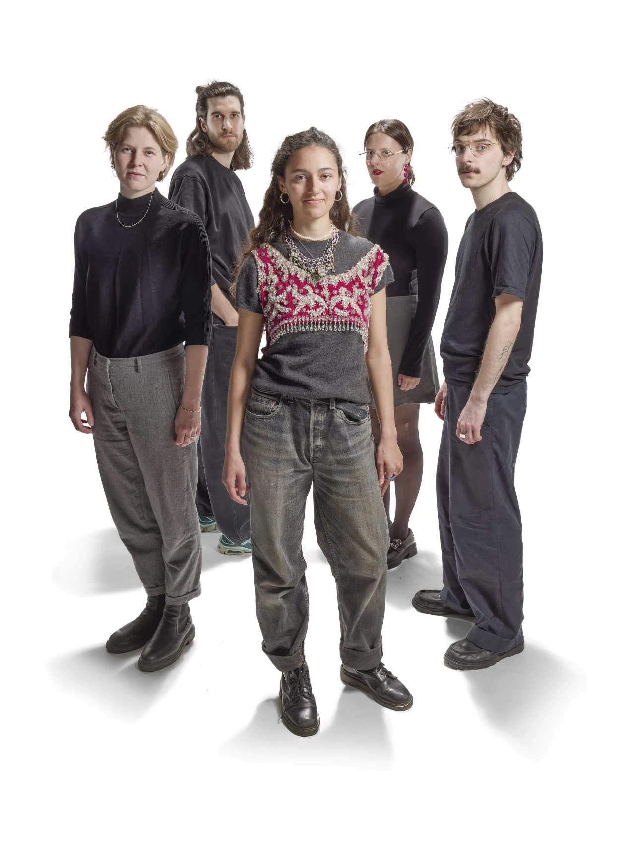 Promotional picture of Sara El Hachimi Quintet with Sara in the center and the other members around her, on a white background.